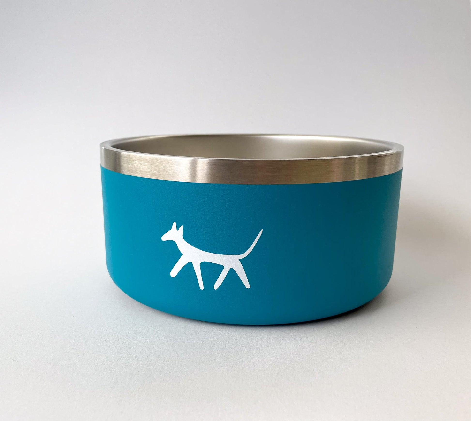 Stainless steel dog water bowl in lake colour with cream Droggo logo on the front. White background.